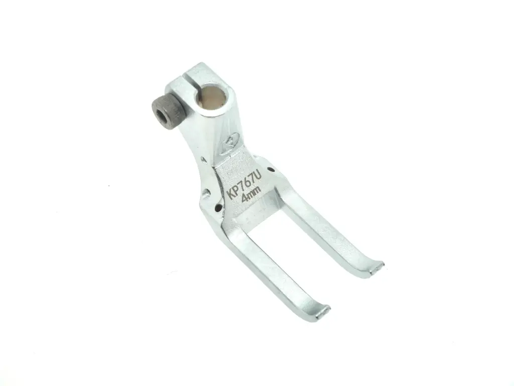 Calcador exterior de 4mm para maquina Durkopp-Adler de 2 agulhas 867-2900